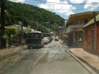 Crappy shot through the windshield but this is a shot of the main road through Marigot, the French capitol. There is road repair going on here which causes traffic to be a bit of a pain. On the left you see a bus stopping for a passenger and a looonnnggg line of vehicles held up behind it. This is quite common but there&#39;s nothing to do but wait it out and carry on. I will say one thing though, the drivers in St Maarten/St Martin are very courteous. They often stop to let you in to traffic or cross over.